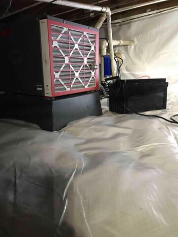 Installation of a Dehumidifier for Moisture Control