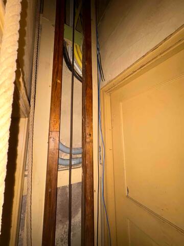 Dual Radon Mitigation System Installation in a 1920s Branford Home