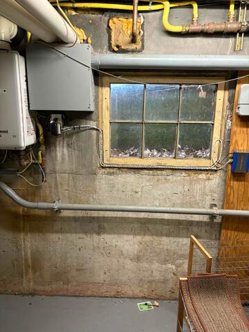 Dual Radon Mitigation System Installation in a 1920s Branford Home