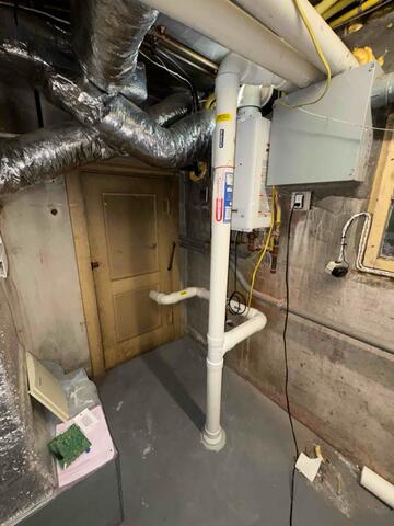 Dual Radon Mitigation System Installation in a 1920s Branford Home