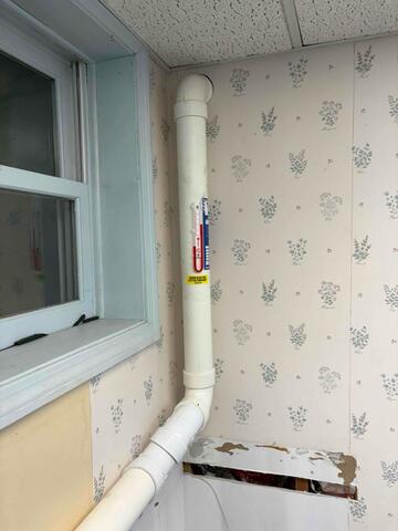 Branford Split-Level Home: Dual Pipe Radon Mitigation