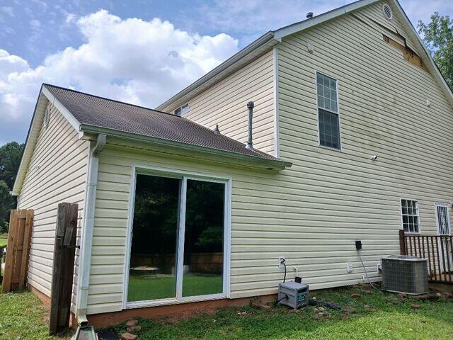 Open-faced 5" gutters not performing up to the homeowners expectations