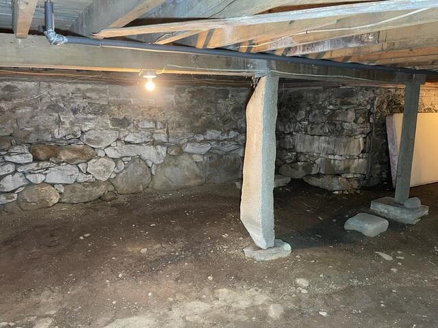 Deteriorating Fieldstone Foundation Wall