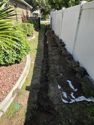 Excavating Trench for Drainage Pipe