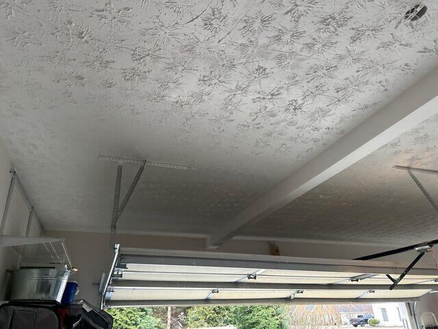 Project Manager Coordinating Repairs with Insurance Agent and Homeowner