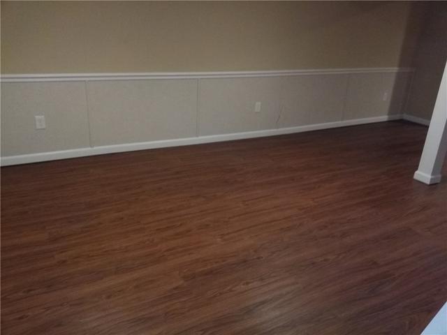 <p>With its new walls and floors, this basement is waterproof and looks fantastic!</p>