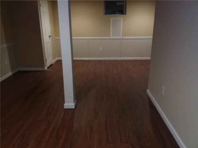 <p>Mill Creek basement flooring has the beautiful look of real wood, but is made out of durable inorganic materials. The flooring will never rot or grow mold.</p>