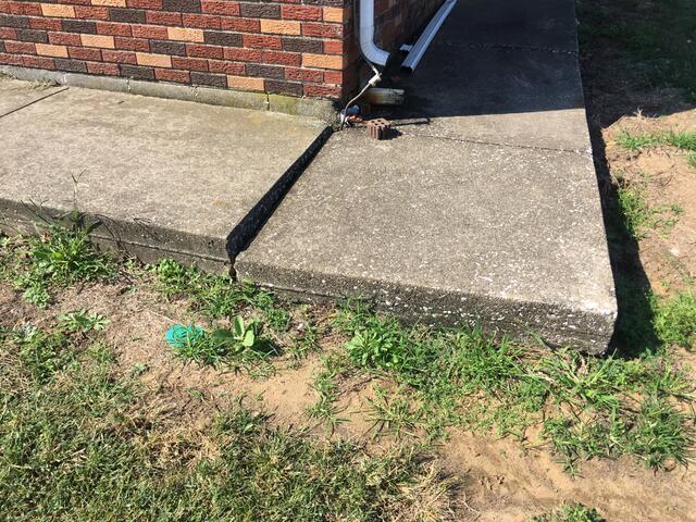 Sinking Concrete Sidewalk