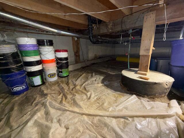 Before Installation - A loose liner and dirty crawl space