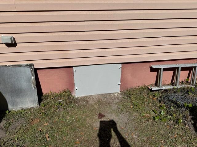 Finishing Touch: Sealed and Secure Crawl Space Access
