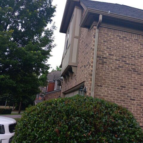 Side of home Rain Drop Gutters