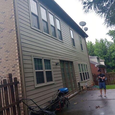 Checking out his new gutter system