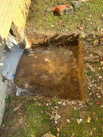 Digging out Area for Crawl Space Entry
