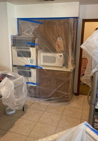 Protective covering before restoration