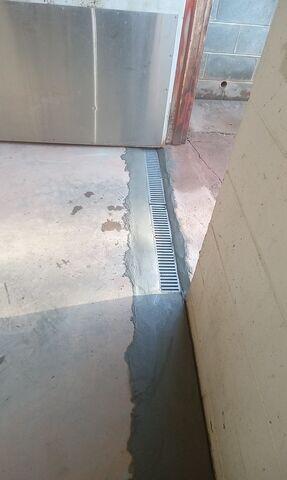 TrenchDrain Installed to Stop Surface Water from Entering the Basement