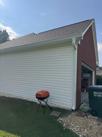 Gutters installed on the side of the home