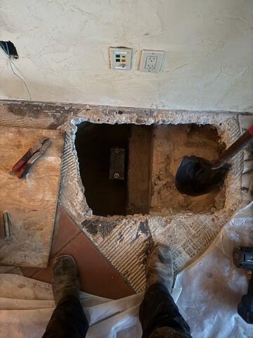 Interior Excavation Reaches Depth for Helical Pier Placement