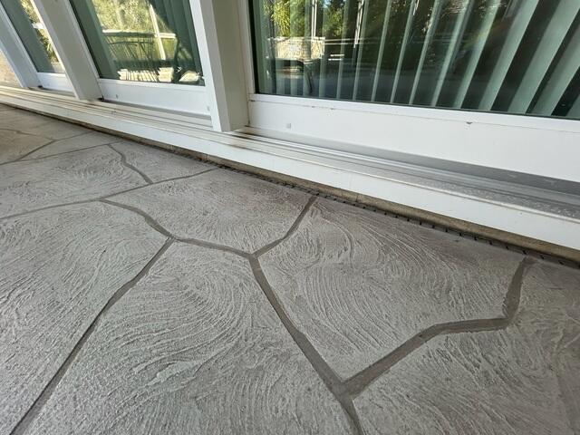 Worn-Out Channel Drain in Need of Replacement