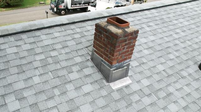 New Flashing Is Installed on the Chimney