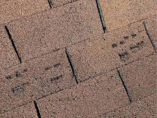 Before: Damaged Shingles