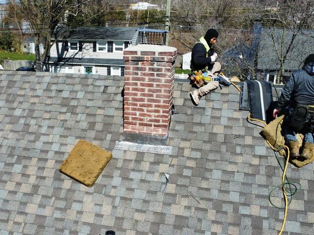 New Flashing Is Installed on the Chimney