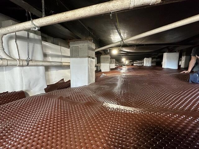 Piers Wrapped and Drainage Matting Installed