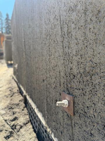 Soil Nail Bearing Plate Installed on Fresh Shotcrete