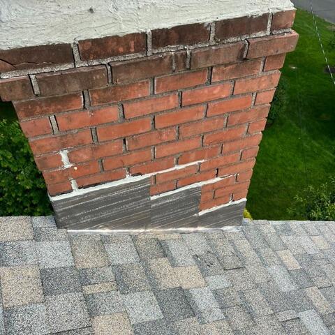 New Flashing Is Installed on the Chimney