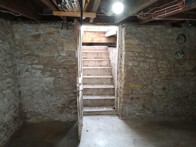 Stone rubble foundation with a walk-out