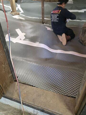 Installing Drainage Matting
