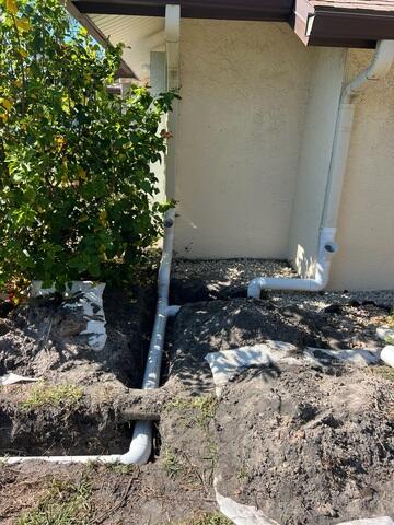Subsurface Downspout Connection