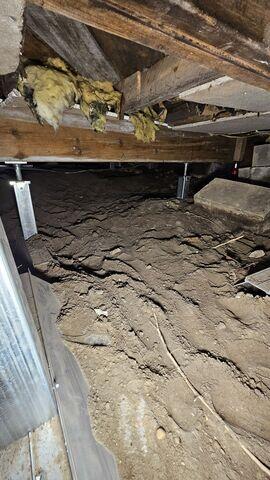 SmartJack® Supports Installed to Lift and Stabilize Sagging Floors