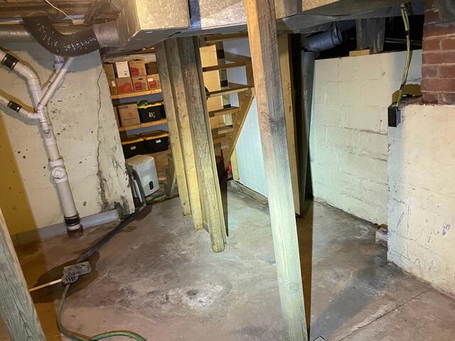 Before: Cracked Walls and Moisture Concerns