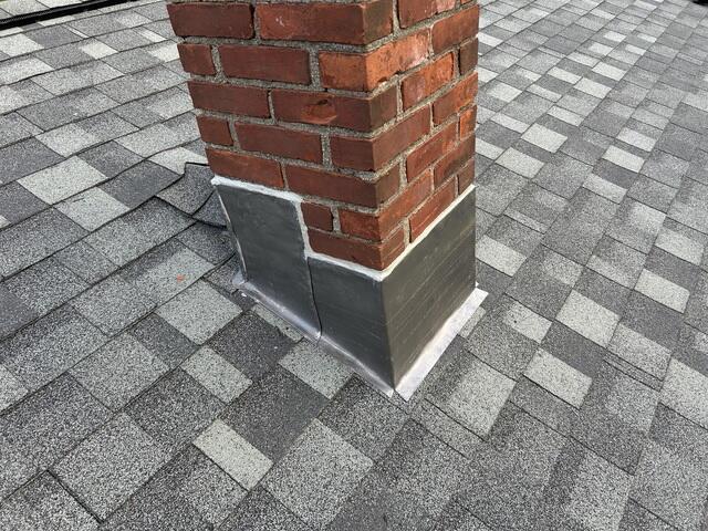 New Flashing Is Installed Around the Chimney