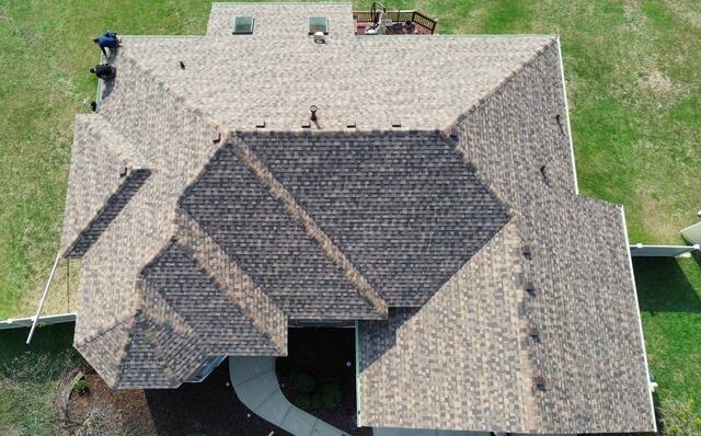 Installing beauty, one shingle at a time.