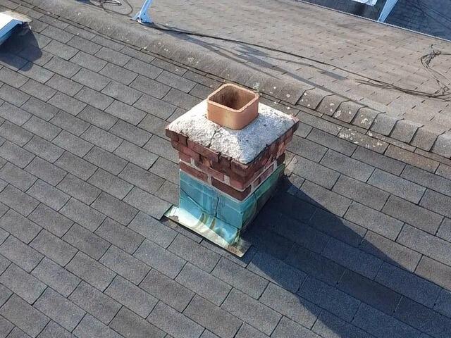 Before: Oxidized Chimney Flashing