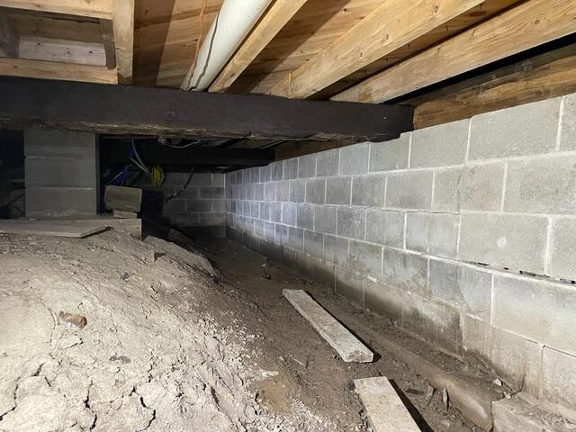 Before: Bowing Foundation Wall