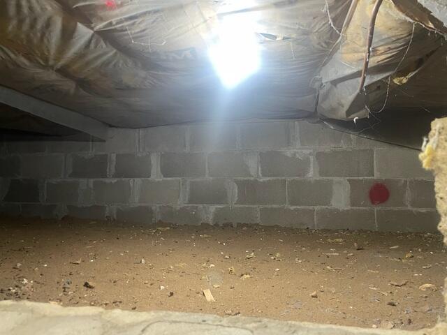 Crawlspace Lacking Insulation and Proper Vapor Protection