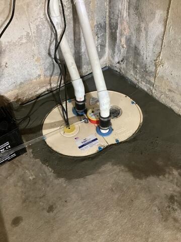 TripleSafe Sump Pump Cemented into Foundation
