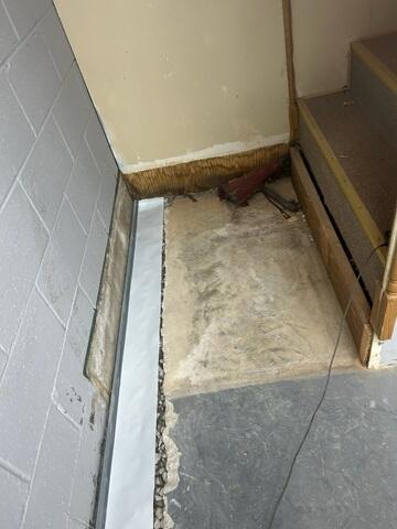 Water Directed Toward Drainage System