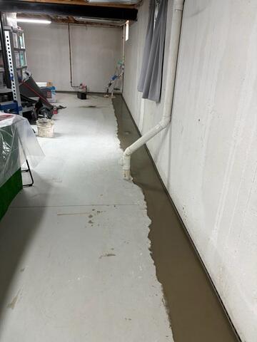 Concrete Seal of the Interior Drainage System.