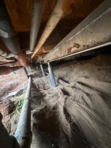 SmartJack Supports Installed to Lift and Stabilize Sagging Floors