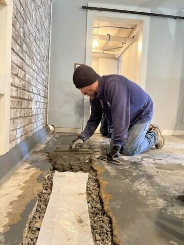 Pouring Concrete Over Drainage System