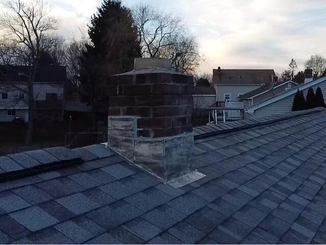 New Flashing Is Installed on the Chimney