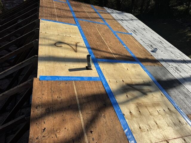 New Plywood, Seams Taped, & Ice and Water Installed