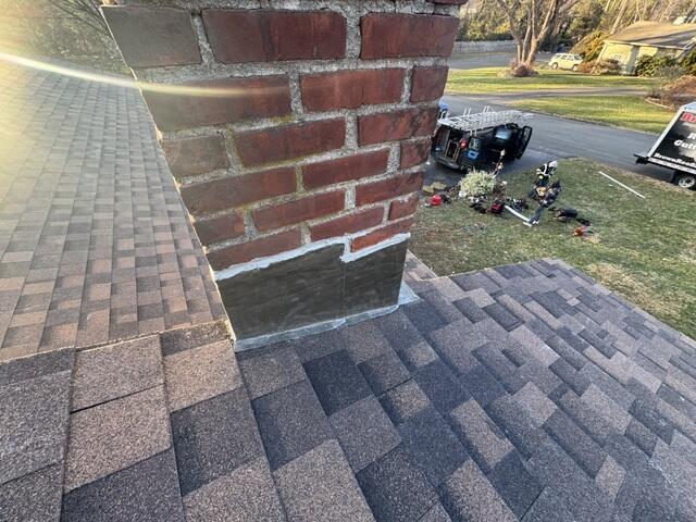 New Flashing Is Installed on the Chimney