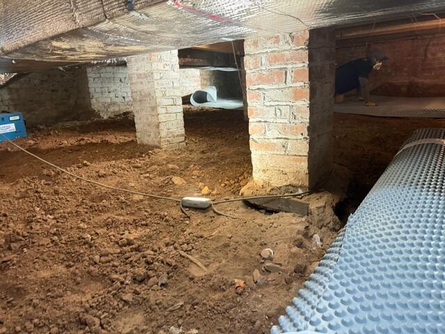 Applying Drainage Matting