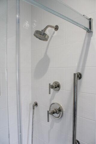 Close-up of Shower Controls and Hand Bar