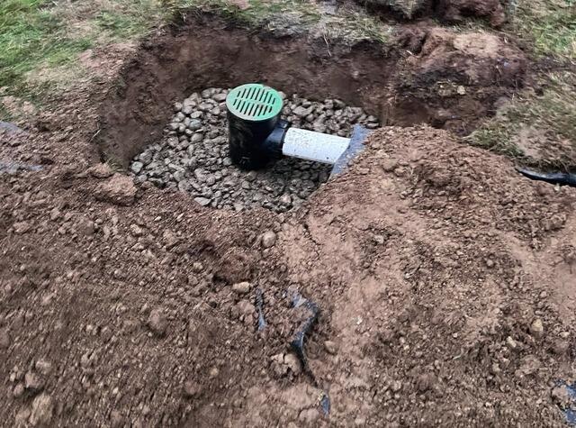 LawnScape Outlet and Discharge line