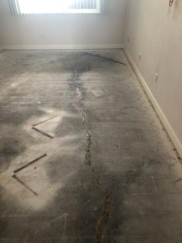 Interior Concrete Slab Settlement Damage